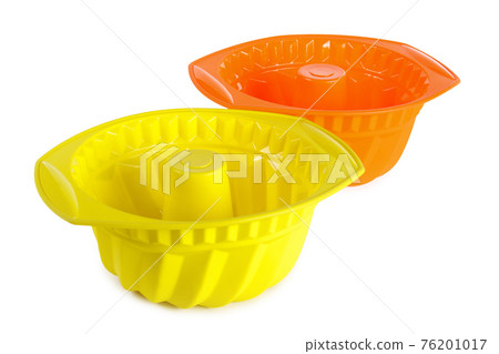 two colored silicone baking molds for muffins, on a white background, isolate 76201017