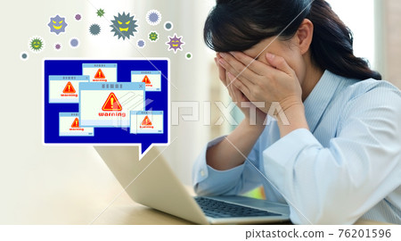 Image of a woman whose computer has been infected with a virus 76201596
