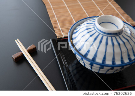 Katsudon bowl black background close-up image material 76202626