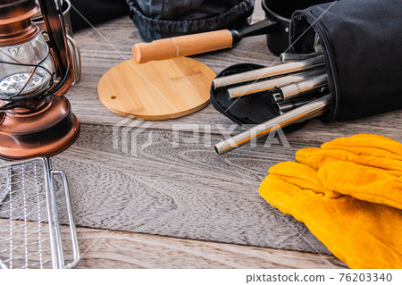 Camping equipment outdoor equipment close-up wood grain table background material Camping equipment outdoor equipment close-up wood grain table background material 76203340