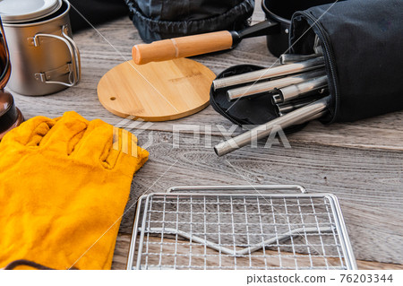 Camping equipment outdoor equipment close-up wood grain table background material 76203344