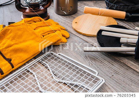 Camping equipment outdoor equipment close-up wood grain table background material Camping equipment outdoor equipment close-up wood grain table background material 76203345