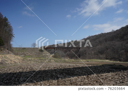 Early spring position river bridge Early spring position river bridge 76203664