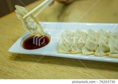 Chopsticks with gyoza 76203736