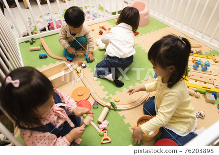 Boys and girls playing with toys Boys and girls playing with toys 76203898