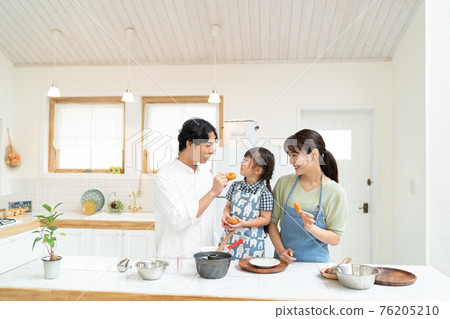 Family enjoying making fun with children Family enjoying making fun with children 76205210