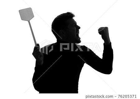 Silhouette of furious man trying to kill mosquito with fly swatter. 76205371