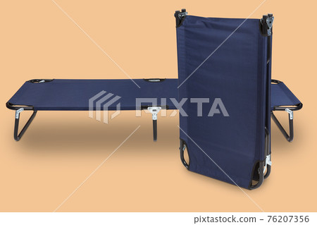two blue clamshells for camping, on a pastel colored background, travel concept two blue clamshells for camping, on a pastel colored background, travel concept 76207356