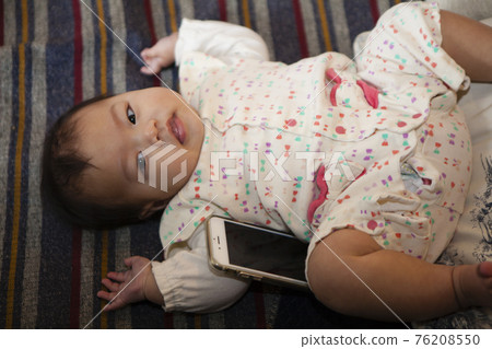 Baby lying down Baby lying down 76208550