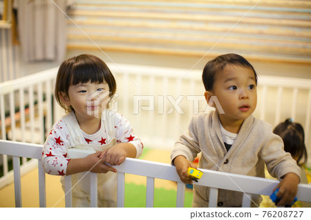 Kids playing in the kids space Kids playing in the kids space 76208727