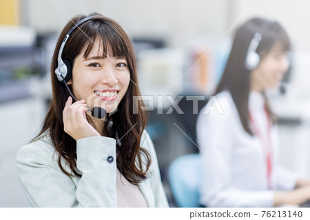Image of a woman working in a call center Image of a woman working in a call center 76213140