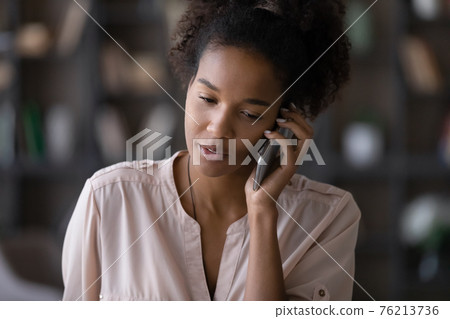 African American woman talk on smartphone gadget African American woman talk on smartphone gadget 76213736