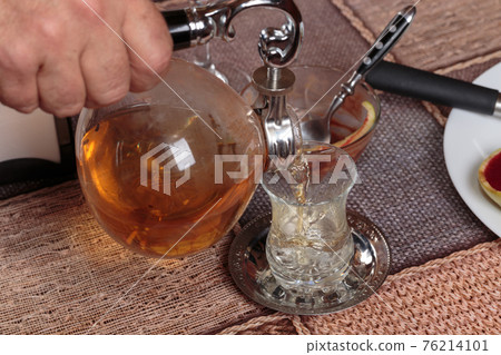 Making herbal tea with a vacuum siphon. Making herbal tea with a vacuum siphon. 76214101