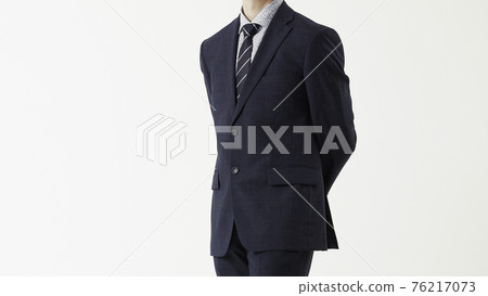 Portrait of a man in a business suit, gray background Portrait of a man in a business suit, gray background 76217073
