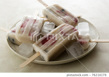 Fruit healthy berry ice cream. Homemade popsicle lolly with strawberries, blueberries and bananas. Fruit healthy berry ice cream. Homemade popsicle lolly with strawberries, blueberries and bananas. 76218178