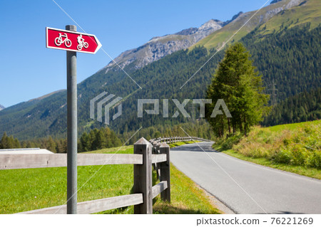 Cycle route directional sign in Switzerland 76221269