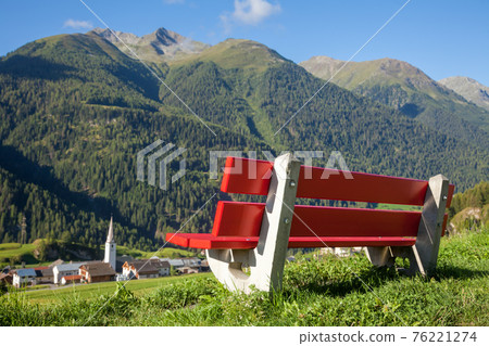 Bench overlooking Engadin Valley in Swiss Alps Bench overlooking Engadin Valley in Swiss Alps 76221274