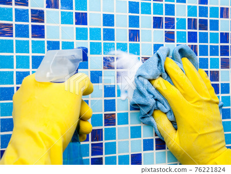 House chores - wiping bathroom wall with cleaning cloth and sprayer House chores - wiping bathroom wall with cleaning cloth and sprayer 76221824