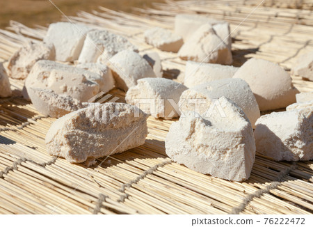 Mongolian Aaruul or Gurt hard cheese drying on sun Mongolian Aaruul or Gurt hard cheese drying on sun 76222472