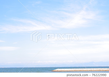 Airplane flying blue sky 76222990