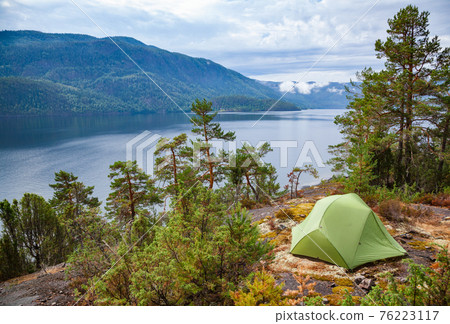 Wild camping by a lake in Norway Wild camping by a lake in Norway 76223117