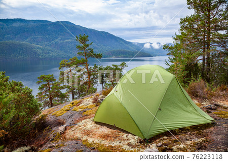 Wild camping by a lake in Norway Wild camping by a lake in Norway 76223118