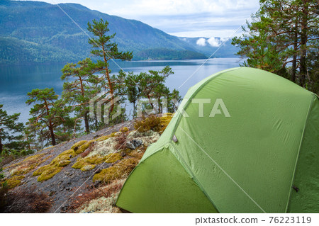 Wild camping by a lake in Norway Wild camping by a lake in Norway 76223119