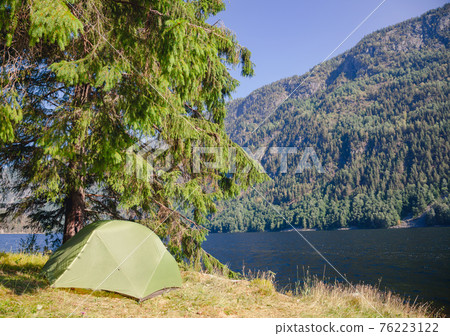 Wild camping by a lake in Norway Wild camping by a lake in Norway 76223122