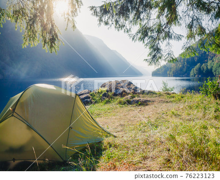 Wild camping by a lake in Norway Wild camping by a lake in Norway 76223123
