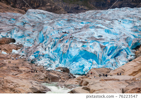 Visitors at Nigardsbreen glacier Jostedalsbreen National Park Sogn og Fjordane Norway Scandinavia Visitors at Nigardsbreen glacier Jostedalsbreen National Park Sogn og Fjordane Norway Scandinavia 76223547