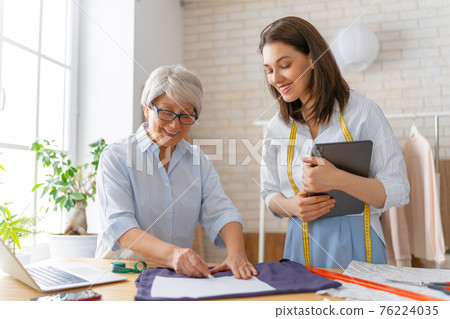 Women are working at workshop Women are working at workshop 76224035