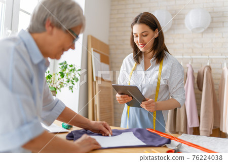 Women are working at workshop Women are working at workshop 76224038
