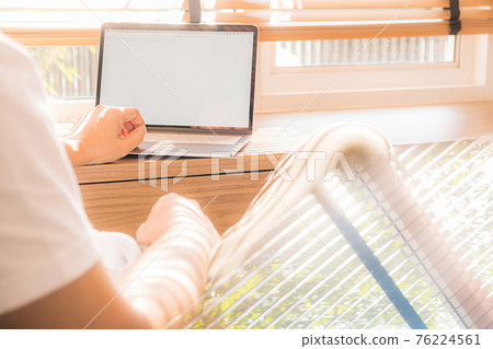 Asian Business Using Laptop Computer Online Working from Home Asian Business Using Laptop Computer Online Working from Home 76224561