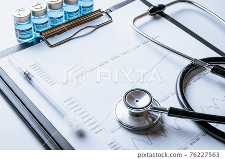 Graphic vaccination. Doctor stethoscope, hospital healthcare infographic charts and analytic medical statistics on hospital background. Vaccine vial by needle syringe with stock index chart. Graphic vaccination. Doctor stethoscope, hospital healthcare infographic charts and analytic medical statistics on hospital background. Vaccine vial by needle syringe with stock index chart. 76227563