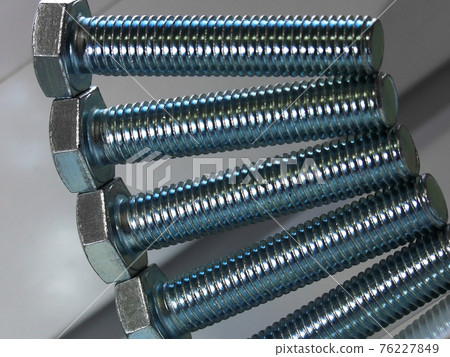 large bolts neatly stacked background for magazine cover large bolts neatly stacked background for magazine cover 76227849