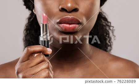 Cropped Image Of Beautiful Nude Black Woman Holding Pink Lipstick In Hand 76228089