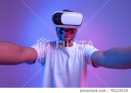 Virtual Entertainment Concept. Closeup Shot Of Excited Black Guy In VR Glasses 76228530
