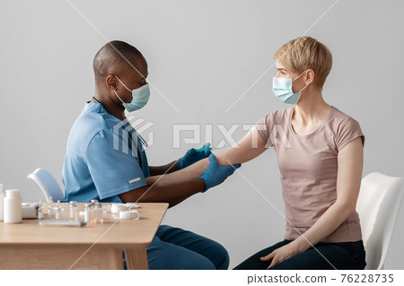 Medical professional care, vaccination against coronavirus for certificate Medical professional care, vaccination against coronavirus for certificate 76228735