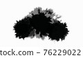 Ink stain slowly spreads over the paper. 76229022