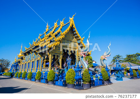 Beautiful of blue temple Wat Rong Sua Ten the amazing temple. 76237177
