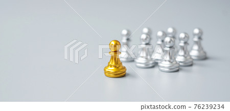 golden chess pawn pieces or leader businessman stand out of crowd people of silver men. leadership, business, team, teamwork and Human resource management concept golden chess pawn pieces or leader businessman stand out of crowd people of silver men. leadership, business, team, teamwork and Human resource management concept 76239234