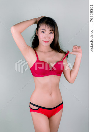 Beauty sexy slim woman body showing red bikini her perfect Beauty sexy slim woman body showing red bikini her perfect 76239591