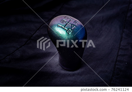 manual gearbox in the car macro black color effect gear Modified handle on wood floor 76241124