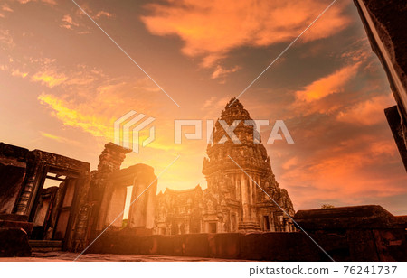 Selective focus on Phimai Historical Park with sunset sky. Landmark of Nakhon Ratchasima, Thailand. Travel destinations. Historic site is ancient. Ancient building. Khmer temple classical architecture 76241737