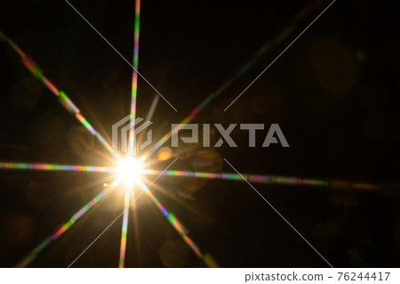Abstract sun flare. The lens flare is subject to digital correction Abstract sun flare. The lens flare is subject to digital correction 76244417
