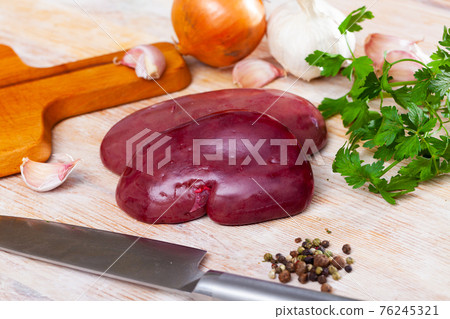 Raw pork kidneys with seasonings Raw pork kidneys with seasonings 76245321