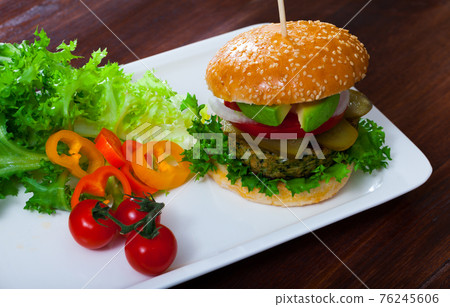 Vegan burger with greens Vegan burger with greens 76245606