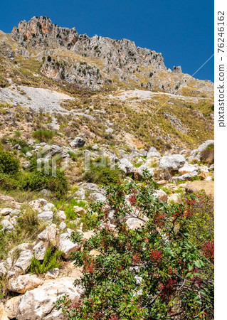View of Rocca del Crasto near Alcara Li Fusi town in the Nebrodi Park, Sicily View of Rocca del Crasto near Alcara Li Fusi town in the Nebrodi Park, Sicily 76246162