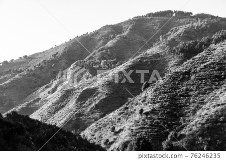 Typical sicilian landscape in the Nebrodi park near the Catafurco waterfalls 76246235