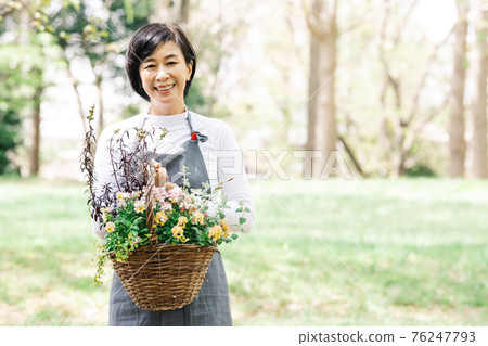 Japanese women gardening and group planting 76247793